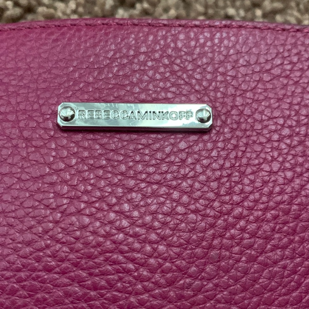 Rebecca Minkoff Multi Zipper leather dark fuchsia leather crossbody purse is in